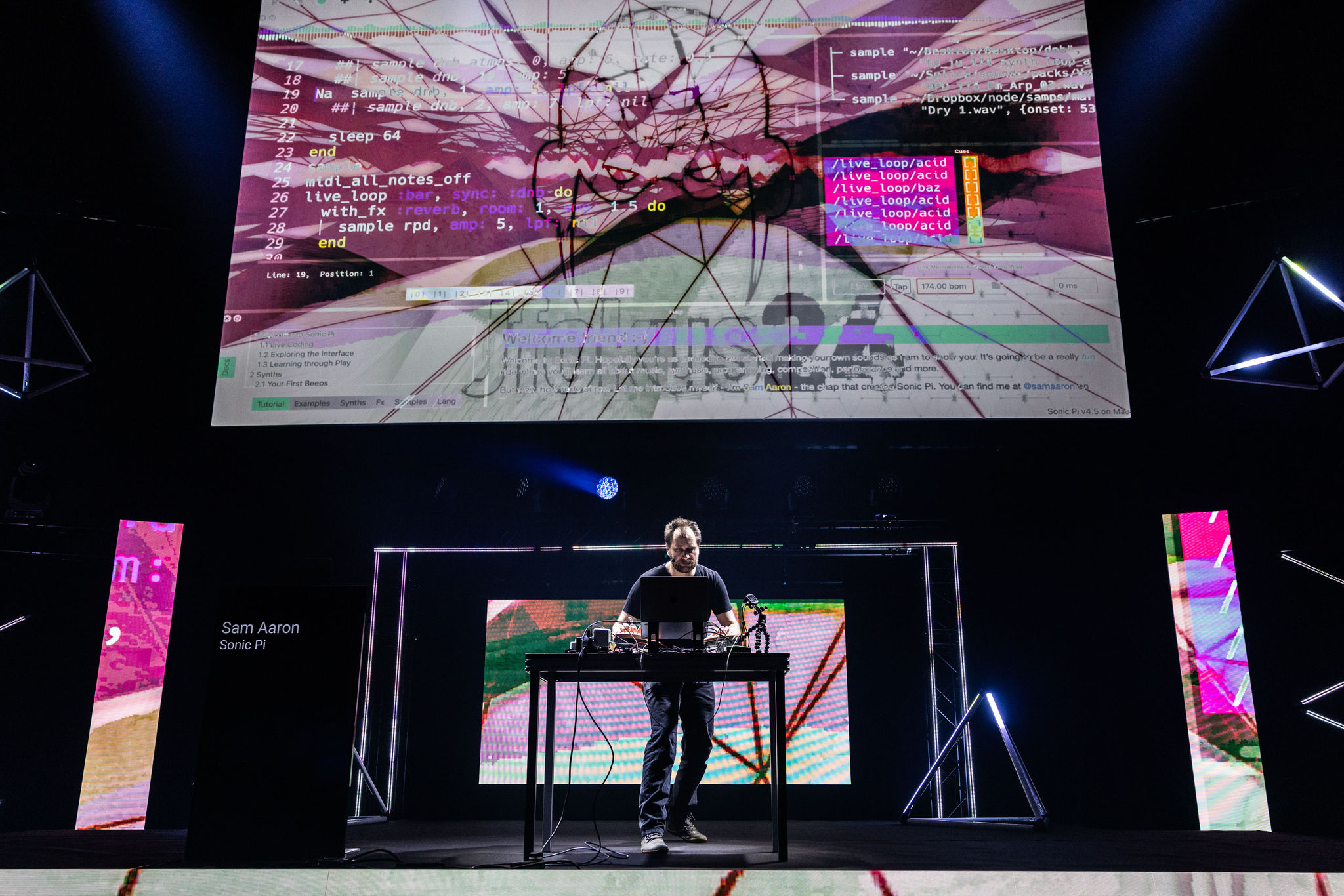 Sam Aaron live coding on stage